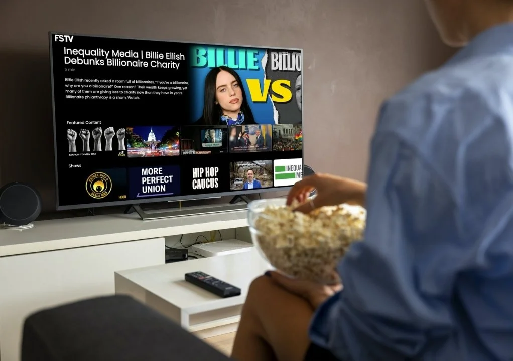 Person watching Free Speech TV on a smart TV